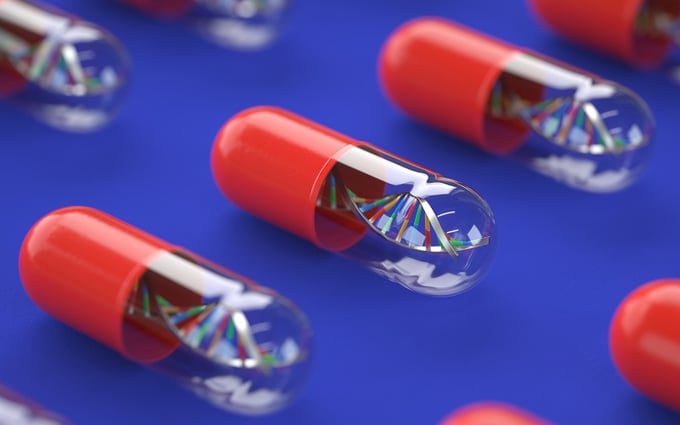 Image of transparent pills containing a DNA helix 