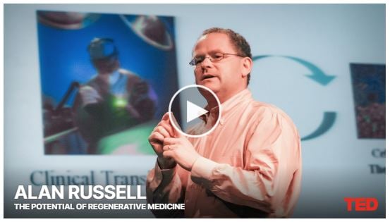 Screen shot of a male presenting person speaking during a TED talk, Text at bottom of image saying ALAN RUSSELL