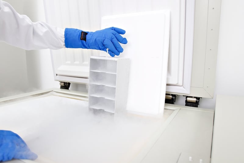 Frozen-Biospecimens-being-removed-from-a-freezer