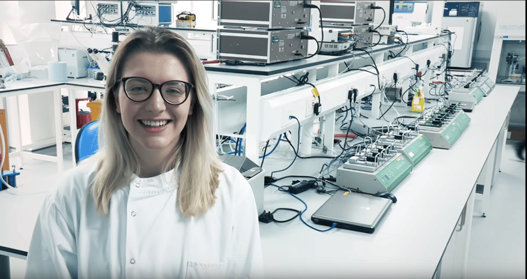 Image showing a female presenting scientist smiling into the camera 
