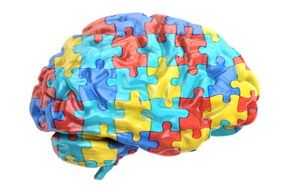 A human brain made up from many multicoloured jigsaw pieces 